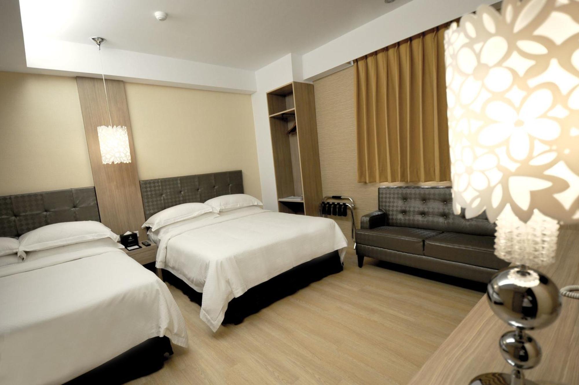 The Riverside Hotel Старе місто Хенчун Номер фото
